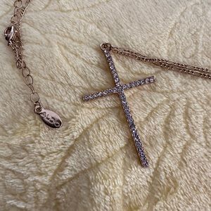 ALDO Brand new cross on a long chain with cubic circonia stones